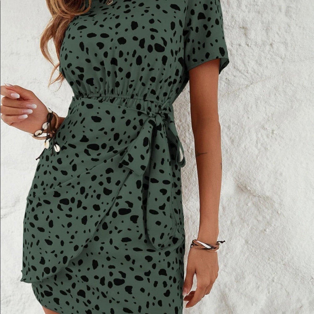 Brand new light weight dress . Perfect for the office or a special event.